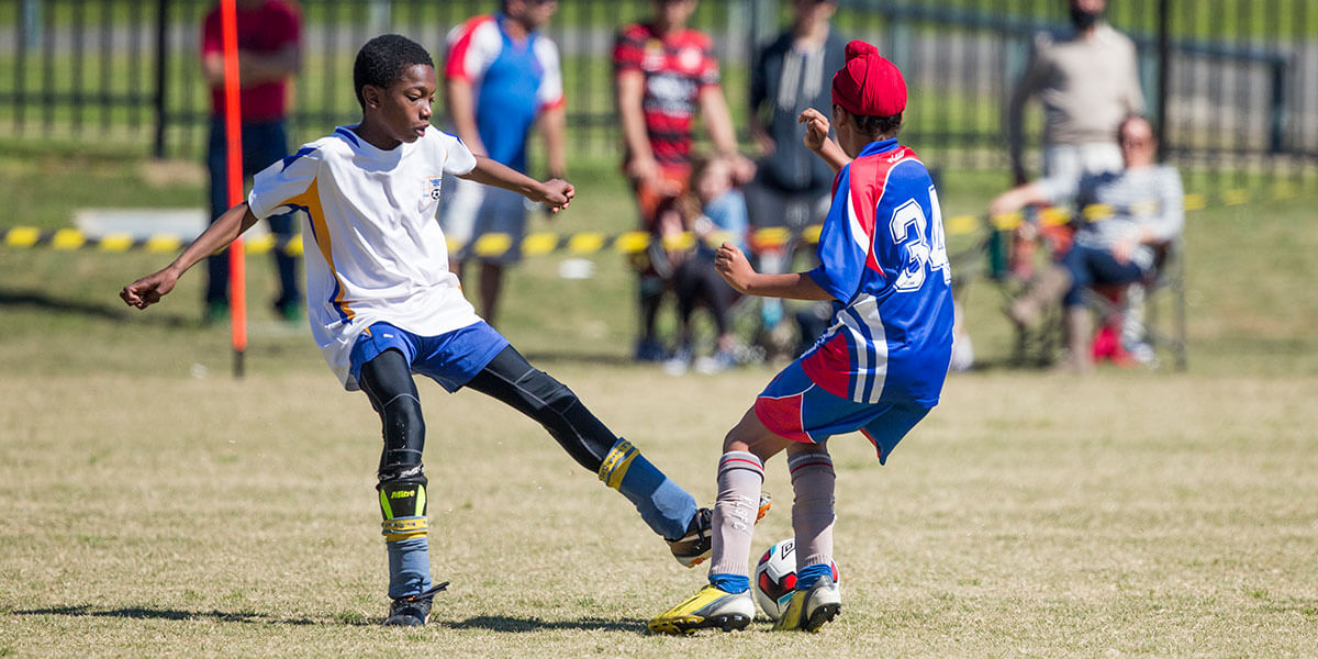 Boys playing soccer