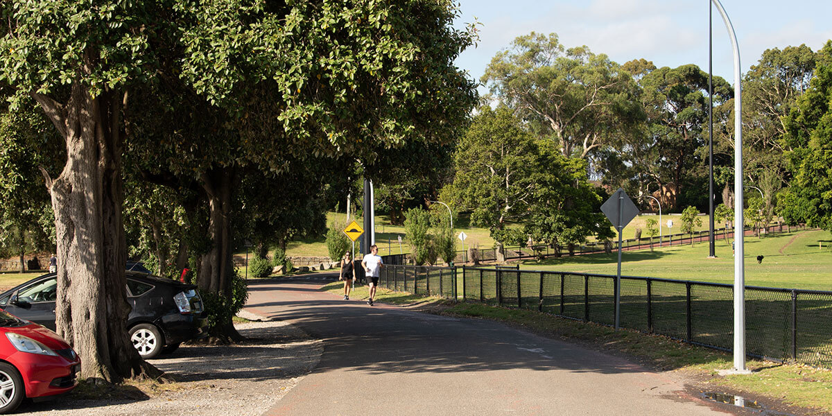 Man and woman joggers in park