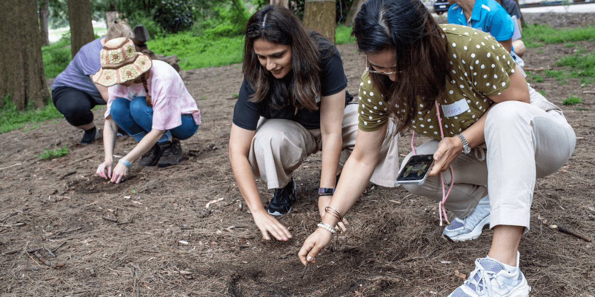 People participating in the establishing inclusive outdoor nature play course.